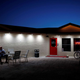 In this April 27, 2018, photo, owner Dennis Hof sits in front of the Love Ranch brothel in Crystal, Nev.